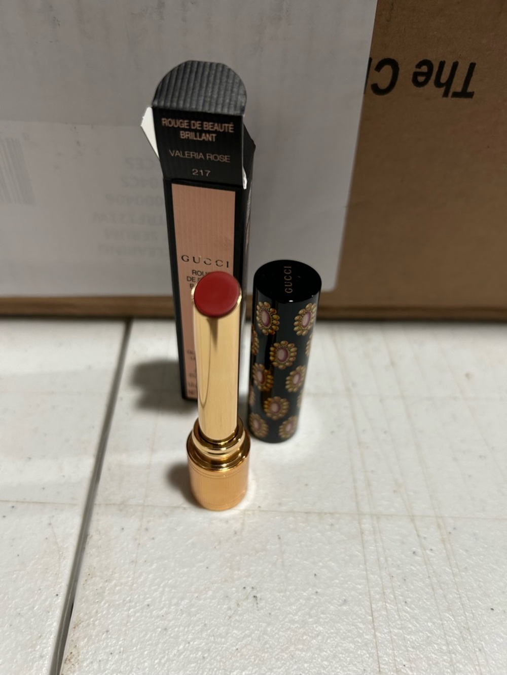 Gucci Lipstick Valeria Rose 217 - Rose Red Bullet with Floral Cap